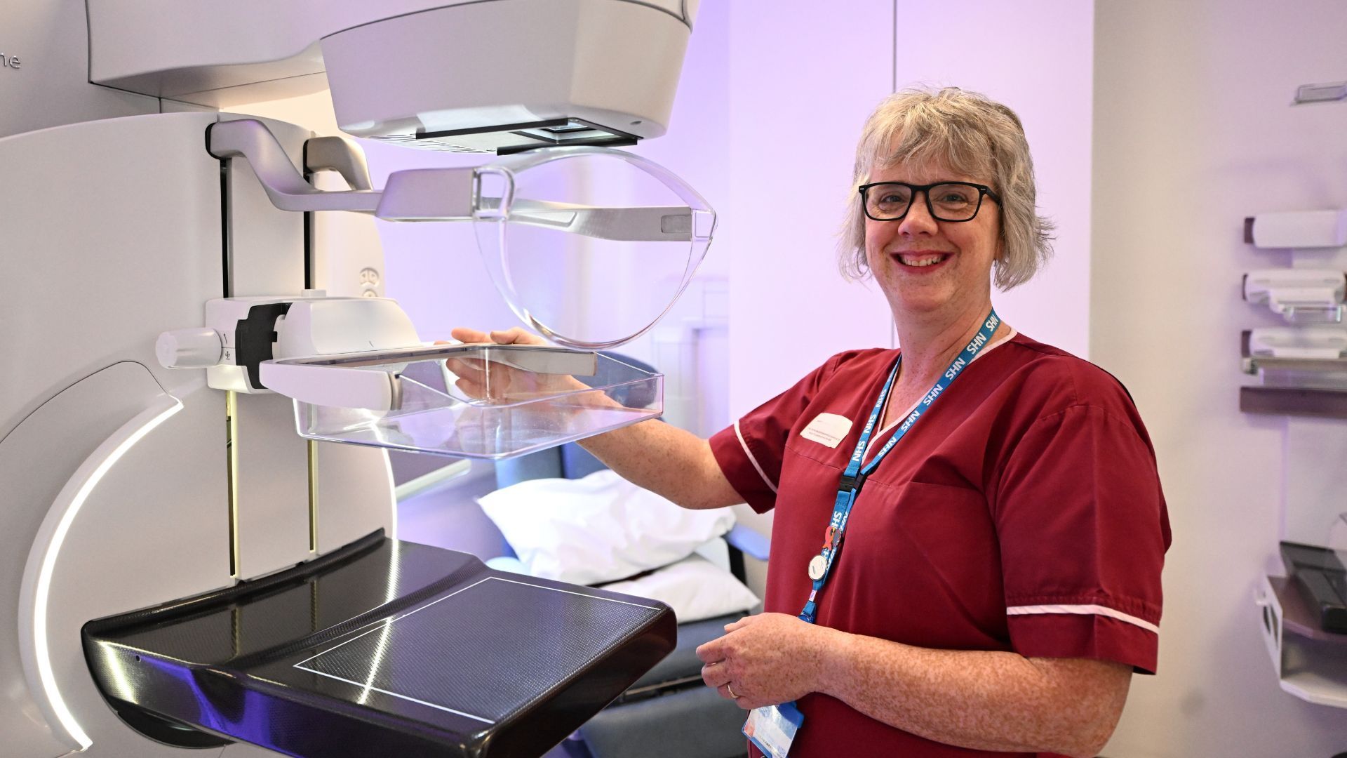 A member of staff in radiography with the new mammography equipment
