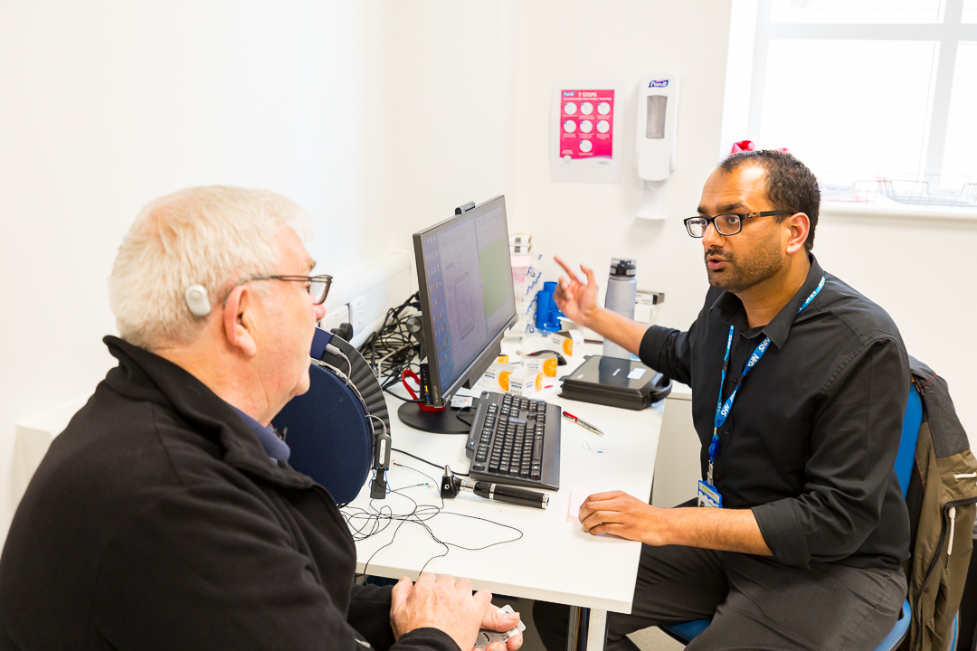 Doctor speaking with a patient