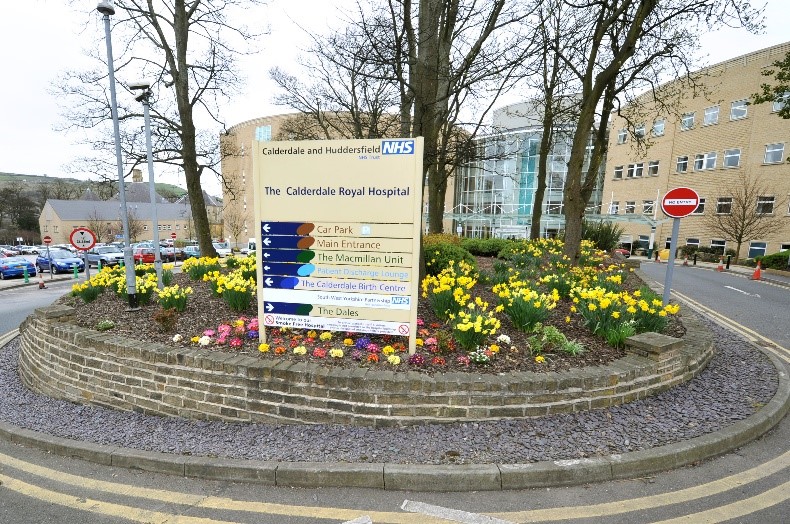 The turning circle is a small roundabout with flowers on it 