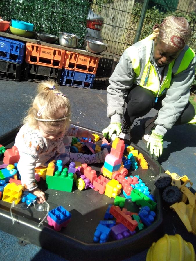 A child plays with building blocks