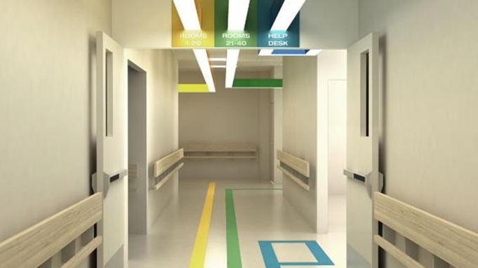 The corridor has coloured lines on the floor and on the ceiling.