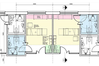 Single-bed blueprint with double toilets and with the measurements.