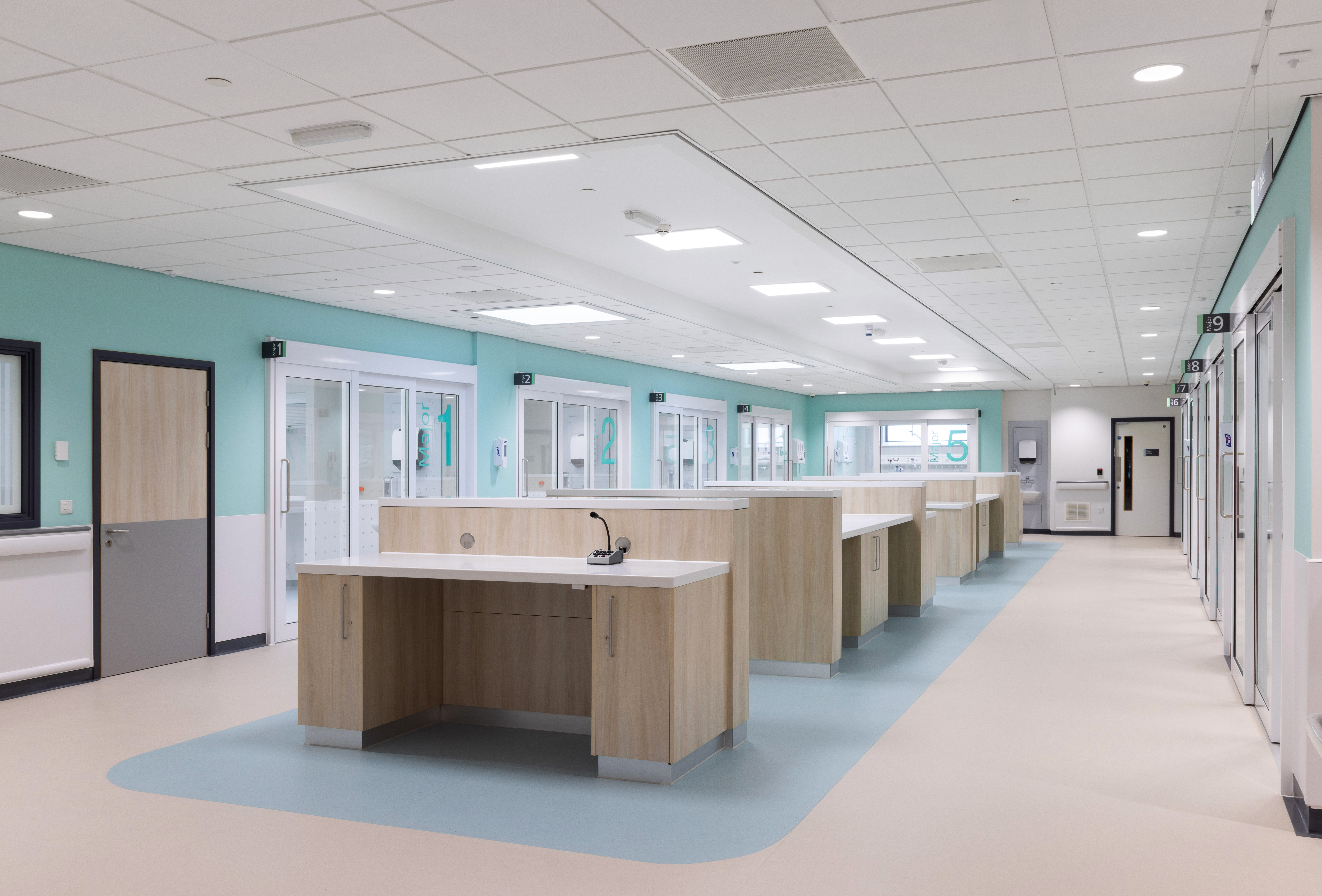 The Majors area of the new A&E has pale blue walls, private cubicles with glass sliding doors and a staff base in the centre of the room
